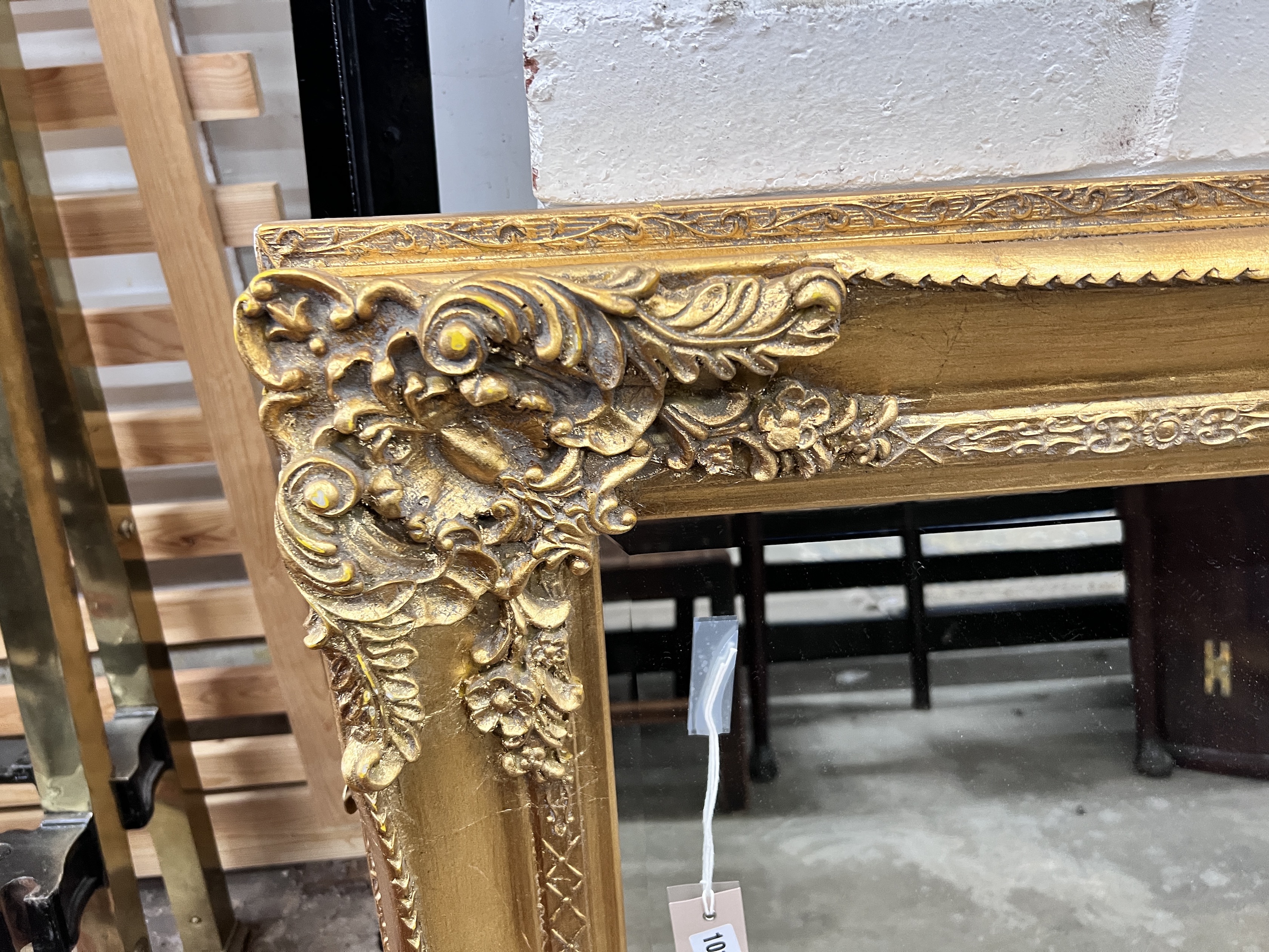 A Victorian style rectangular gilt framed wall mirror, width 113cm, height 82cm